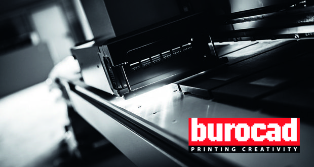 Wat hebben een snelgroeier uit Limburg, XS tot XXXL, 3 Printsalons en 1999 met elkaar gemeen?